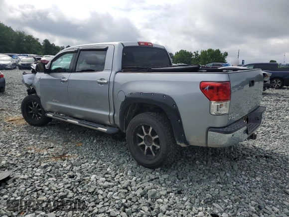 2012 Toyota Tundra Limited with VIN 5TFHW5F18CX233781, listed as a Copart auction lot 57956925 with 208,629 mi miles and Salvage title. Bid and sale history available at DreamBid. Image 2.