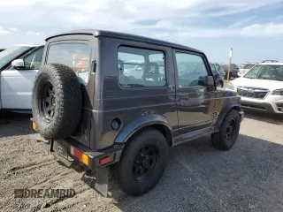 1986 Suzuki Samurai z VIN JS3JC51V8G4110639, wystawiony jako Copart lot #75466894 z przebiegiem Nie podano mil oraz Szkody całkowita. Historia ofert i sprzedaży dostępna na DreamBid. Obrazek 3.
