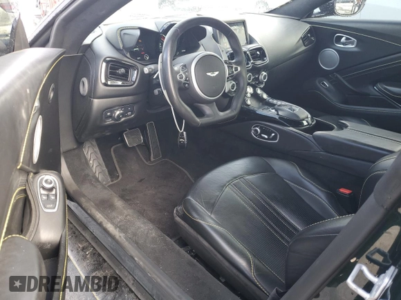 2020 Aston Martin Vantage z VIN SCFSMGAW4LGN03942, wystawiony jako Copart lot #49004855 z przebiegiem 42 583 mil mil oraz Szkody całkowita. Historia ofert i sprzedaży dostępna na DreamBid. Obrazek 8.