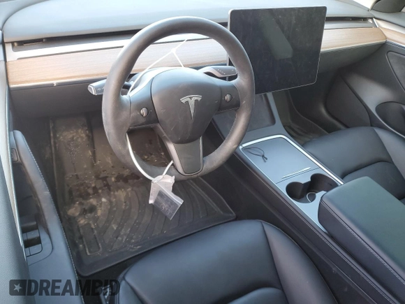 2023 Tesla Model 3 with VIN 5YJ3E1EA7PF496089, listed as a Copart auction lot 87101254 with 42,830 mi miles and Salvage Title. Bid and sale history available at DreamBid. Image 8.