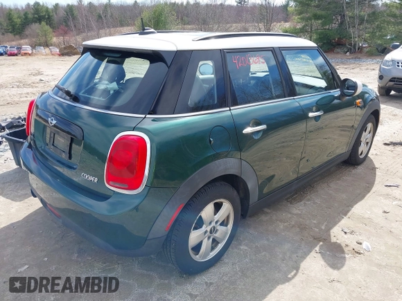 2016 MINI Hardtop 4 Door with VIN WMWXU1C57G2D09401, listed as a IAAI auction lot 42013695 with 43,437 mi miles and . Bid and sale history available at DreamBid. Image 4.