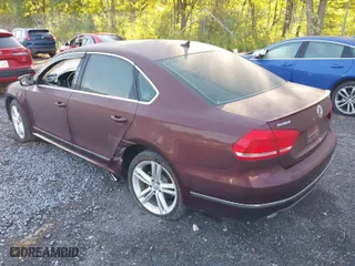 2013 Volkswagen Passat TDI SEL Premium with VIN 1VWCN7A33DC031549, listed as a IAAI auction lot 40313029 with 104,184 mi miles. Bid and sale history available at carsss.com. Image 3.