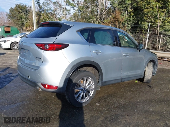 2020 Mazda CX-5 Grand Touring z VIN JM3KFADM0L0738337, wystawiony jako IAAI lot #41485078 z przebiegiem Nie podano mil oraz . Historia ofert i sprzedaży dostępna na DreamBid. Obrazek 4.