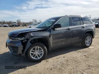 2025 Jeep Grand Cherokee Laredo with VIN 1C4RJHAG0SC268997, listed as a Copart auction lot 45860945 with 1,036 mi miles and Salvage Title. Bid and sale history available at DreamBid. Image 1.