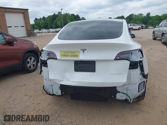 2021 Tesla Model Y Long Range with VIN 5YJYGDEE7MF198867, listed as a IAAI auction lot 42117463 with 79,759 mi miles and . Bid and sale history available at DreamBid. Image 16.