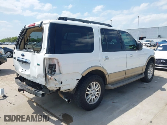 2014 Ford Expedition XLT with VIN 1FMJU1H56EEF41736, listed as a IAAI auction lot 42050840 with 150,538 mi miles and . Bid and sale history available at DreamBid. Image 4.