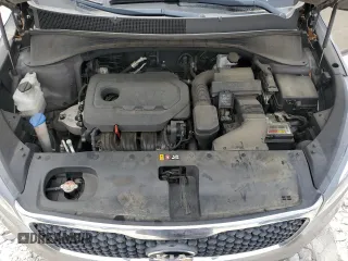 2018 Kia Sorento LX z VIN 5XYPG4A31JG406679, wystawiony jako Copart lot #55087315 z przebiegiem 146 171 mil mil oraz Szkoda całkowita • Salvage title. Historia ofert i sprzedaży dostępna na DreamBid. Obrazek 12.