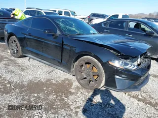 2019 Ford Mustang EcoBoost with VIN 1FA6P8TH8K5173458, listed as a IAAI auction lot 41085251 with 99,260 mi miles and . Bid and sale history available at carsss.com. Image 1.