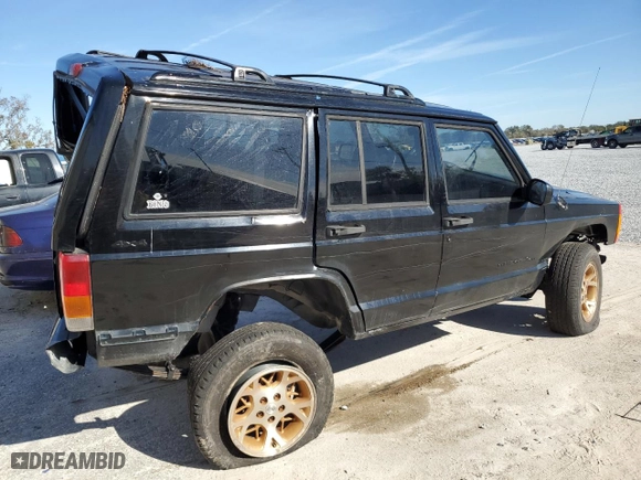 2000 Jeep Cherokee Police with VIN 1J4FF48S1YL246243, listed as a Copart auction lot 84954674 with 0 mi miles and Salvage Title. Bid and sale history available at carsss.com. Image 3.