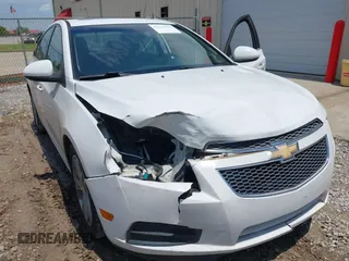 2014 Chevrolet Cruze 2LT z VIN 1G1PE5SB7E7115794, wystawiony jako IAAI lot #42271519 z przebiegiem 160 369 mil mil oraz . Historia ofert i sprzedaży dostępna na DreamBid. Obrazek 6.