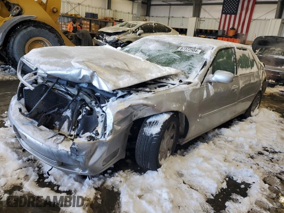 2002 Cadillac DeVille DTS with VIN 1G6KF57912U199809, listed as a Copart auction lot 87372504 with 154,663 mi miles and Salvage Title. Bid and sale history available at carsss.com. Image 1.