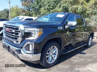 2021 GMC Sierra 1500 SLT z VIN 1GTU9DED7MZ174191, wystawiony jako IAAI lot #40378166 z przebiegiem 94 834 mil mil oraz . Historia ofert i sprzedaży dostępna na DreamBid. Obrazek 2.