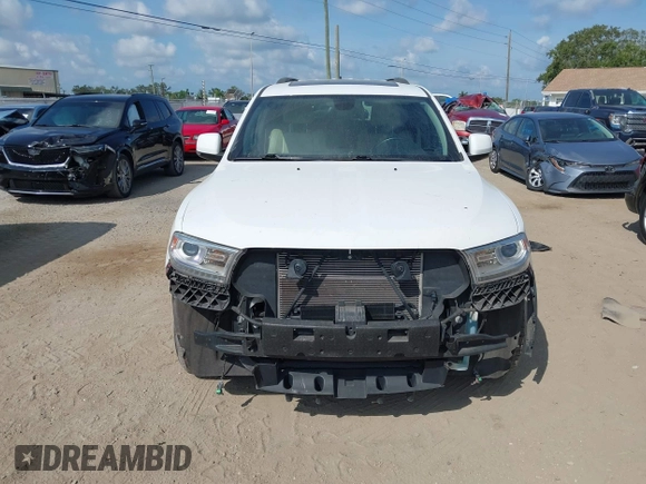 2014 Dodge Durango Limited with VIN 1C4RDJDGXEC323129, listed as a IAAI auction lot 42318727 with 148,451 mi miles and . Bid and sale history available at DreamBid. Image 13.