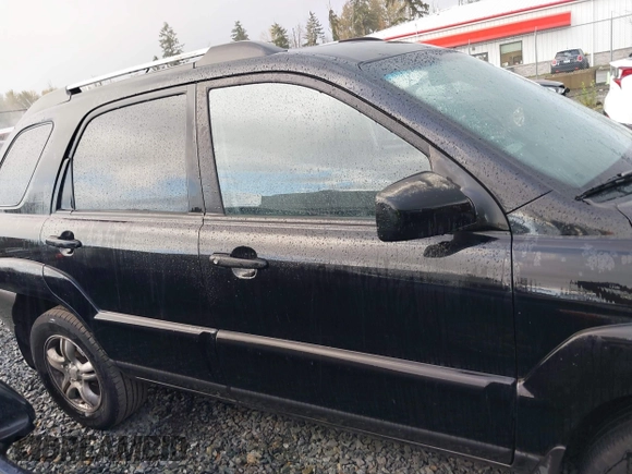 2005 Kia Sportage LX with VIN KNDJF723557054234, listed as a IAAI auction lot 40652851 with 220,215 mi miles and . Bid and sale history available at carsss.com. Image 13.