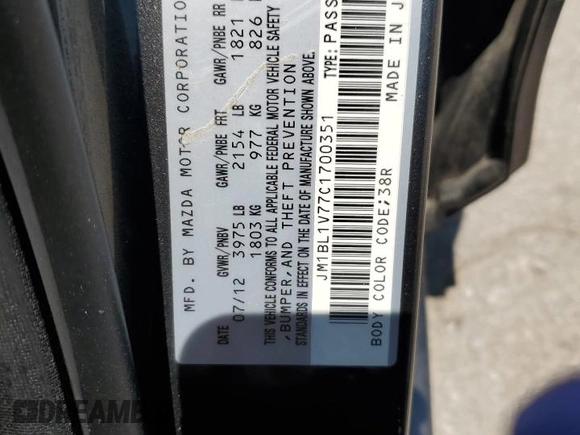 2012 Mazda 3 i Touring with VIN JM1BL1V77C1700351, listed as a Copart auction lot 59268645 with Not provided miles and Salvage title. Bid and sale history available at DreamBid. Image 12.