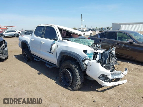 2020 Toyota Tacoma SR5 with VIN 3TMCZ5ANXLM297886, listed as a IAAI auction lot 41965591 with Not provided miles and . Bid and sale history available at DreamBid. Image 1.