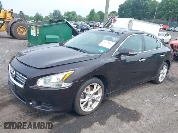 2014 Nissan Maxima SV with VIN 1N4AA5AP2EC489345, listed as a IAAI auction lot 42511861 with 136,155 mi miles and . Bid and sale history available at DreamBid. Image 2.