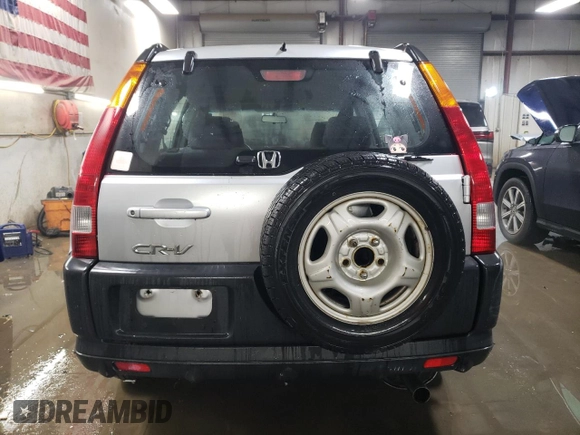 2002 Honda CR-V LX with VIN JHLRD68512C009941, listed as a Copart auction lot 87699075 with 133,311 mi miles and Salvage Title. Bid and sale history available at DreamBid. Image 6.