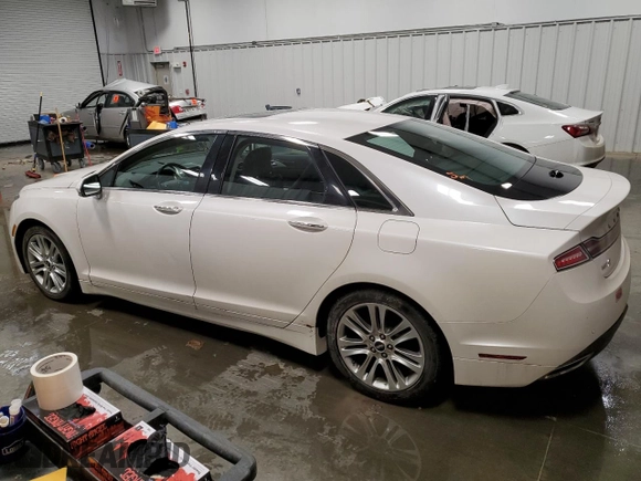 2014 Lincoln MKZ with VIN 3LN6L2JK3ER810979, listed as a Copart auction lot 50785605 with 89,141 mi miles and Salvage Title. Bid and sale history available at carsss.com. Image 2.