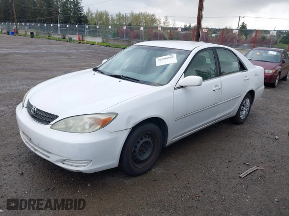 2004 Toyota Camry LE with VIN JTDBE32K840256161, listed as a IAAI auction lot 42000050 with 367,016 mi miles. Bid and sale history available at carsss.com. Image 2.
