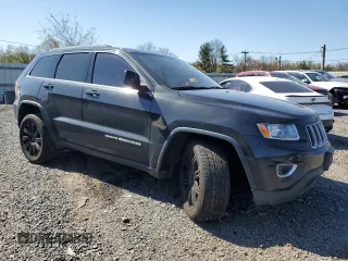 2014 Jeep Grand Cherokee Laredo with VIN 1C4RJFAG4EC210321, listed as a Copart auction lot 53574595 with 119,650 mi miles and Salvage Title. Bid and sale history available at DreamBid. Image 4.