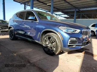 2019 BMW X5 xDrive40i with VIN 5UXCR6C5XKLL07933, listed as a Copart auction lot 59389395 with 87,251 mi miles and Salvage title. Bid and sale history available at DreamBid. Image 4.