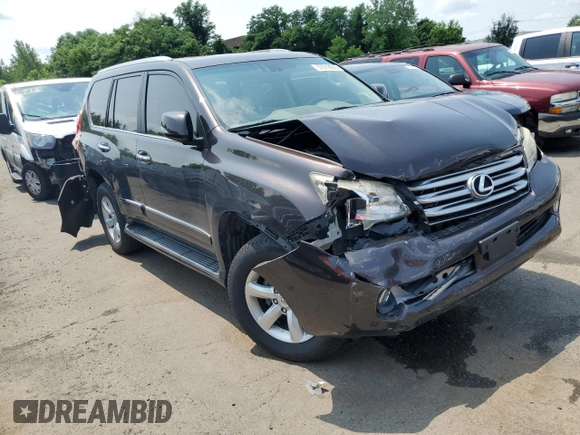 2012 Lexus GX 460 with VIN JTJBM7FX9C5036817, listed as a Copart auction lot 57619005 with 172,994 mi miles and Salvage title. Bid and sale history available at DreamBid. Image 4.