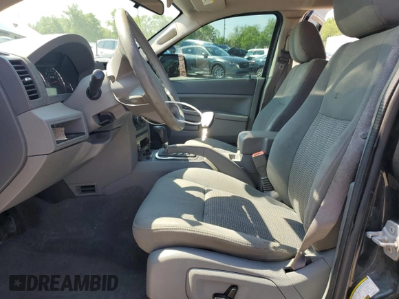 2007 Jeep Grand Cherokee Laredo z VIN 1J8GR48K17C668294, wystawiony jako Copart lot #56686165 z przebiegiem 245 172 mil mil oraz Szkoda całkowita • Salvage title. Historia ofert i sprzedaży dostępna na DreamBid. Obrazek 7.