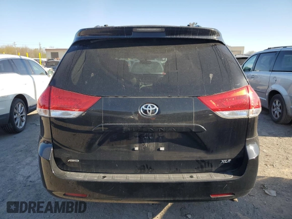 2014 Toyota Sienna Limited z VIN 5TDDK3DC5ES074424, wystawiony jako Copart lot #52831905 z przebiegiem 188 531 mil mil oraz Szkoda całkowita • Salvage title. Historia ofert i sprzedaży dostępna na DreamBid. Obrazek 6.