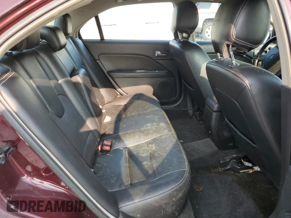 2012 Ford Fusion SEL z VIN 3FAHP0JA4CR410011, wystawiony jako Copart lot #57872835 z przebiegiem 187 756 mil mil oraz Szkoda całkowita • Salvage title. Historia ofert i sprzedaży dostępna na DreamBid. Obrazek 10.