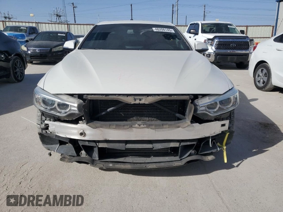 2015 BMW 4 Series 428i z VIN WBA3N3C56FK234418, wystawiony jako Copart lot #48208145 z przebiegiem 66 796 mil mil oraz Szkoda całkowita • Salvage title. Historia ofert i sprzedaży dostępna na DreamBid. Obrazek 5.