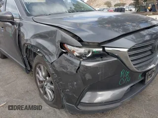 2018 Mazda CX-9 Sport with VIN JM3TCABY1J0224741, listed as a IAAI auction lot 41265876 with 126,686 mi miles and . Bid and sale history available at DreamBid. Image 6.