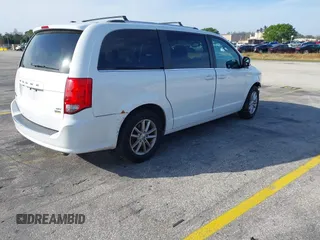 2018 Dodge Grand Caravan SXT with VIN 2C4RDGCG5JR179043, listed as a IAAI auction lot 41642462 with 117,264 mi miles and . Bid and sale history available at DreamBid. Image 4.