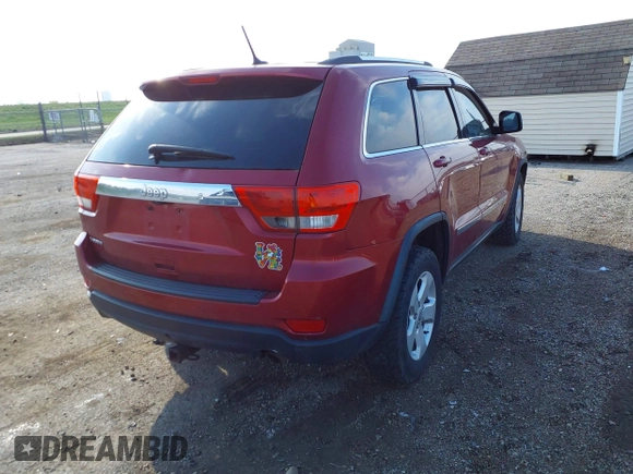 2013 Jeep Grand Cherokee Laredo with VIN 1C4RJEAG9DC538259, listed as a IAAI auction lot 41832676 with 143,000 mi miles. Bid and sale history available at carsss.com. Image 4.