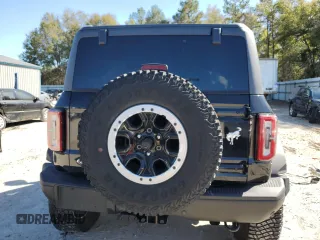 2023 Ford Bronco z VIN 1FMDE5CP6PLB31740, wystawiony jako Copart lot #50167915 z przebiegiem 9 307 mil mil oraz Szkoda całkowita • Salvage title. Historia ofert i sprzedaży dostępna na DreamBid. Obrazek 6.