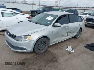 2011 Volkswagen Jetta Sedan SE w/Convenience & Sunroof PZEV with VIN 3VWDZ7AJ6BM340273, listed as a IAAI auction lot 41709714 with 156,491 mi miles. Bid and sale history available at carsss.com. Image 2.