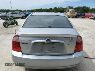 2006 Kia Spectra EX with VIN KNAFE121665348840, listed as a Copart auction lot 69798184 with 0 mi miles and Salvage Title. Bid and sale history available at carsss.com. Image 6.