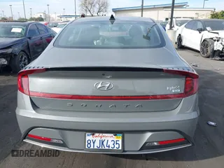 2022 Hyundai Sonata Hybrid Blue with VIN KMHL24JJ5NA037502, listed as a IAAI auction lot 40975379 with 69,018 mi miles. Bid and sale history available at carsss.com. Image 17.