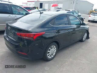 2021 Hyundai Accent SE with VIN 3KPC24A63ME148528, listed as a IAAI auction lot 42426884 with 23,429 mi miles and . Bid and sale history available at DreamBid. Image 4.