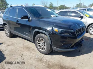 2019 Jeep Cherokee Latitude Plus with VIN 1C4PJMLX0KD233514, listed as a IAAI auction lot 41758401 with 99,035 mi miles. Bid and sale history available at carsss.com. Image 1.