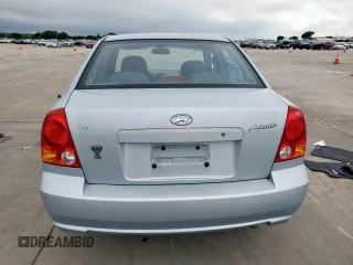 2003 Hyundai Accent GL z VIN KMHCG45C73U481294, wystawiony jako Copart lot #55958005 z przebiegiem 136 964 mil mil oraz Czysty tytuł • Clean title. Historia ofert i sprzedaży dostępna na DreamBid. Obrazek 6.