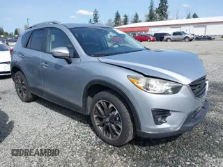 2016 Mazda CX-5 Grand Touring with VIN JM3KE4DYXG0647802, listed as a IAAI auction lot 41996854 with 85,774 mi miles. Bid and sale history available at carsss.com. Image 1.