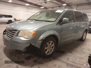 2010 Chrysler Town & Country Touring with VIN 2A4RR5D12AR344895, listed as a IAAI auction lot 41791990 with 259,541 mi miles. Bid and sale history available at carsss.com. Image 23.