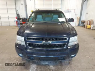2009 Chevrolet Suburban LT w/1LT with VIN 1GNFK26319R272557, listed as a IAAI auction lot 42138238 with 223,599 mi miles. Bid and sale history available at carsss.com. Image 12.