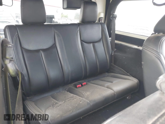 2013 Jeep Wrangler Rubicon 10th Anniversary with VIN 1C4BJWCG8DL639121, listed as a IAAI auction lot 40561773 with 56,023 mi miles and . Bid and sale history available at DreamBid. Image 8.