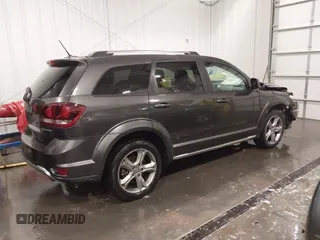 2017 Dodge Journey Crossroad Plus with VIN 3C4PDCGB5HT517269, listed as a IAAI auction lot 41835856 with 97,876 mi miles and . Bid and sale history available at DreamBid. Image 4.