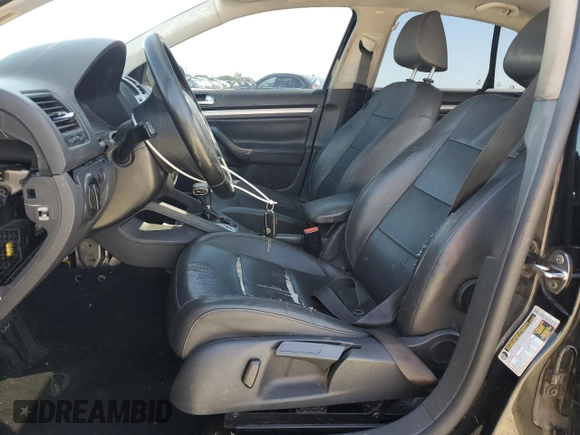 2009 Volkswagen Jetta SE with VIN 3VWRZ71K39M139505, listed as a Copart auction lot 57687645 with 217,149 mi miles and Salvage title. Bid and sale history available at DreamBid. Image 7.
