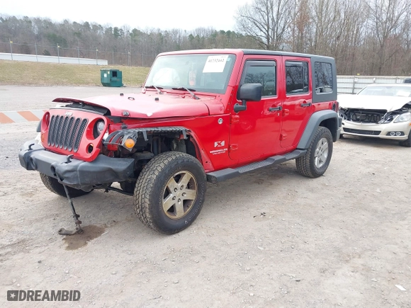 2009 Jeep Wrangler Unlimited X with VIN 1J4GA39169L712057, listed as a IAAI auction lot 41732442 with 158,769 mi miles. Bid and sale history available at carsss.com. Image 17.