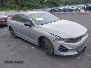 2022 Kia K5 GT-Line z VIN 5XXG64J27NG129590, wystawiony jako IAAI lot #40400781 z przebiegiem 5 509 mil mil oraz . Historia ofert i sprzedaży dostępna na DreamBid. Obrazek 1.