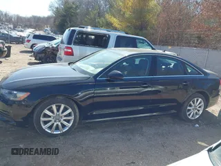 2014 Audi A6 Prestige z VIN WAUHMAFCXEN014381, wystawiony jako IAAI lot #41794551 z przebiegiem 133 649 mil mil oraz . Historia ofert i sprzedaży dostępna na DreamBid. Obrazek 14.